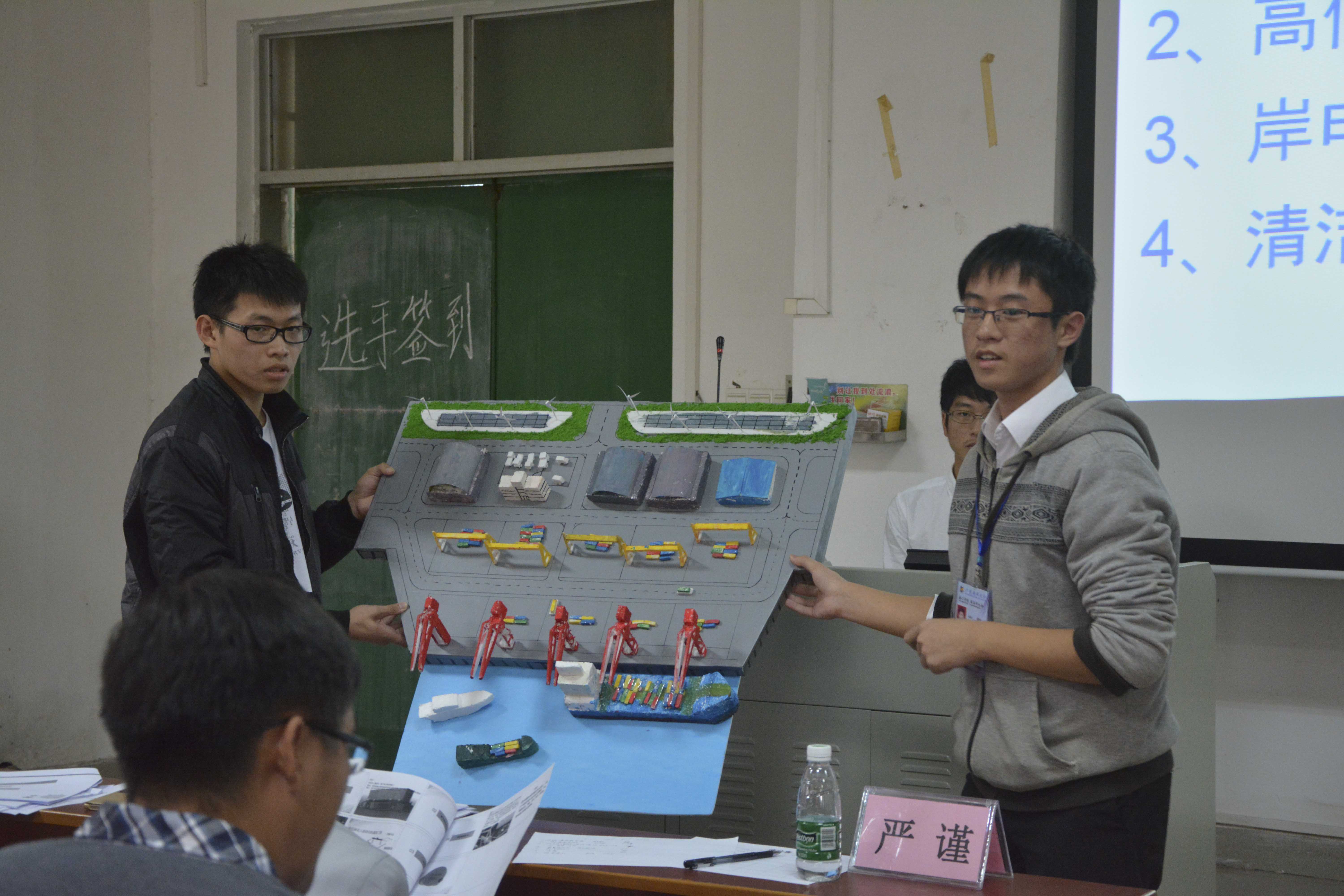 C:\Users\Administrator\Desktop\学科竞赛新闻报道\选手在展示作品模型.jpg C:\Users\Administrator\Desktop\学科竞赛新闻报道\选手在展示作品模型.jpg